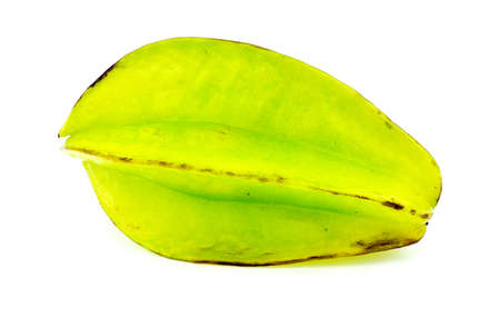 Vibrant ripe star fruit isolated on whiteの写真素材
