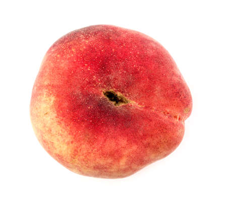 Aerial of isolated donut saturn peach fruit on whiteの写真素材
