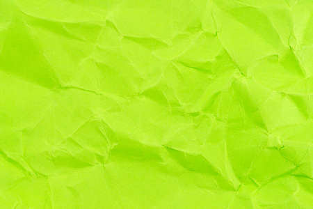 Green crumpled background paper textureの写真素材