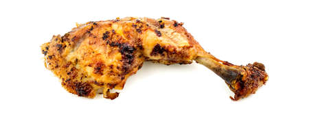 Organic farm fed roasted chicken leg drumstickの写真素材