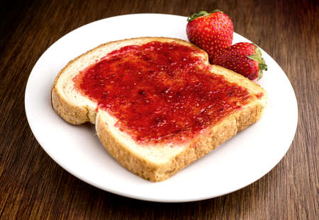 Strawberry jam on toastの写真素材
