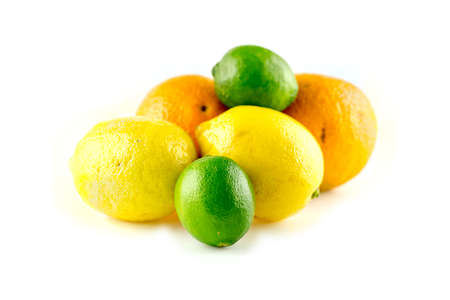Pile of tasty citrus fruits with oranges lemons and limesの写真素材