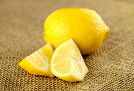 Organic lemon on rustic agriculture backgroundの写真素材