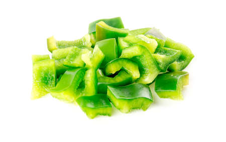 Chopped up pieces of green capsicum pepperの写真素材