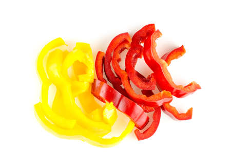 Tantalizing strips of organic bell peppers on whiteの写真素材