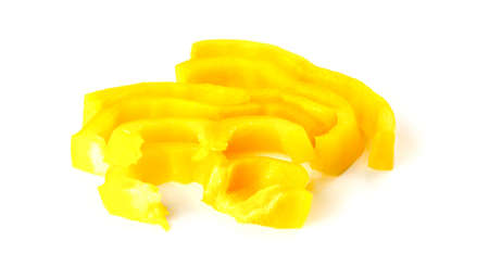 Macro closeup of chopped yellow pepper on whiteの写真素材