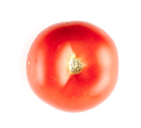 Top of juicy red tomatoe against white backgroundの写真素材