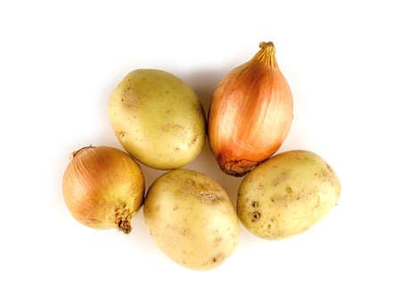 Aerial view of whole onions and fresh potatoesの写真素材