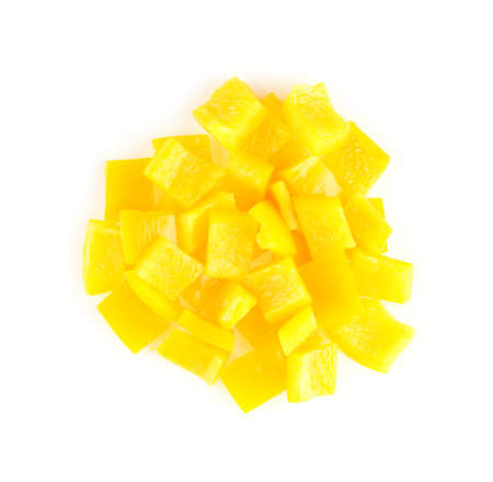 Circular pile of chopped yellow capsicum on white backgroundの写真素材