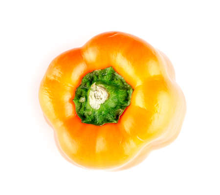 Top view of ripe orange capsicum isolated on whiteの写真素材