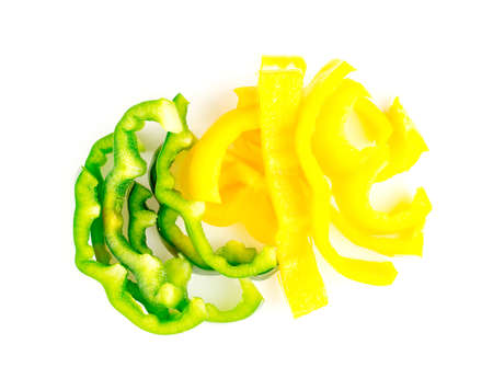 Bright and vibrant green and yellow colours of capsicum peppersの写真素材