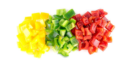 Aerial view of tasty raw yellow green and red bell peppers against white backgroundの写真素材