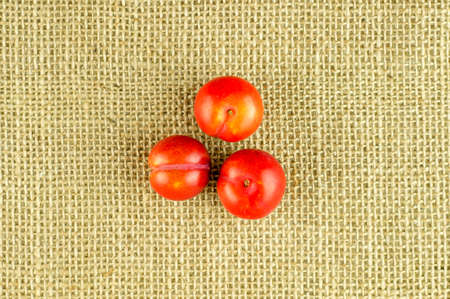 Aerial view of three sweet cherry plumsの写真素材