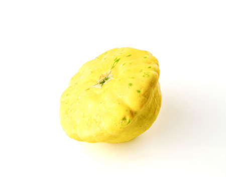 Yellow patty pan squash with scallop shaped edgeの写真素材