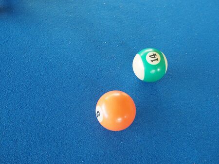 Pool Balls On A Blue Pool Table