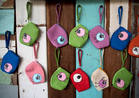 sheep pocket bag on wood background