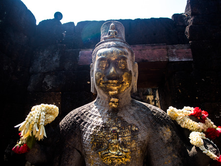 Sandstone statue of god Khmer Art at Prasat Muang Singh in Kanjanaburi , Thailand.のeditorial素材