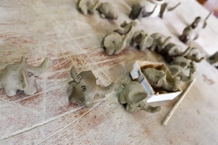 Making pottery, doing a toy from clay.の写真素材