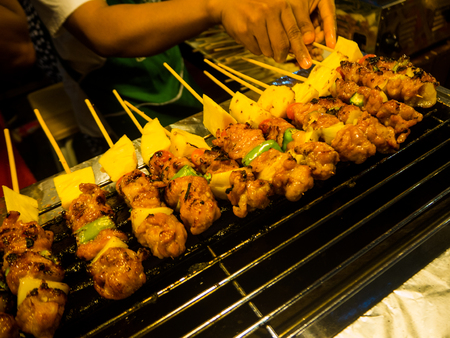 cooking pork satay, thai cuisine (food).の写真素材