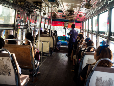 Inside a bus, public transportation in Bangkok, Thailand.のeditorial素材