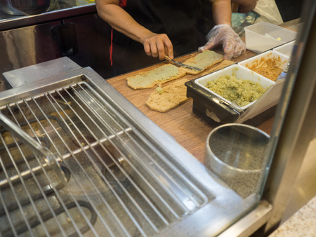 Singapore Breakfast called Kaya Toast, Coffee bread and Half boiled eggs.の写真素材