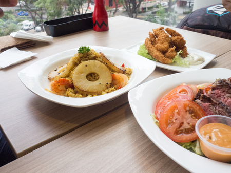 Pineapple fried rice , Fried rice with pineapple raisin shrimp , Thai food.の写真素材