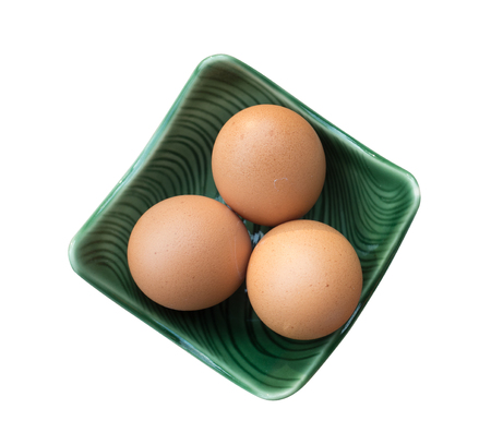 Top view of chicken eggs in a bowl, clipping path. Selection pathの写真素材