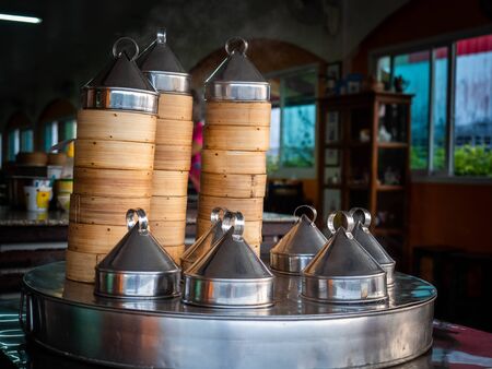 dim sum Steaming pot in a Chinese restaurant. dim sum chinese food in bamboo basketの写真素材