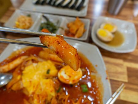 Tteokbokki (Korean spicy rice cake) Cheese in Korean restuarant.の写真素材