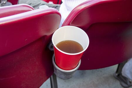 Drink holder on a baseball stadium chair