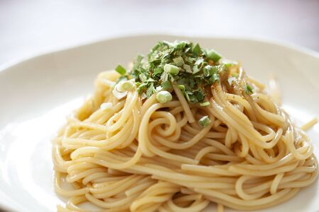 Japanese style spaghetti with dried green onionの写真素材