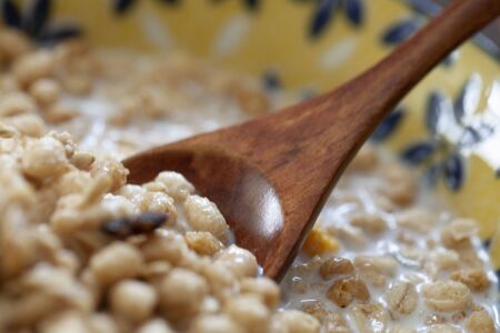 Milk poured cereal and dried fruits