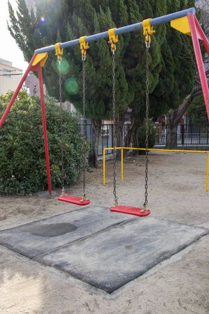Red swing in Japanese park