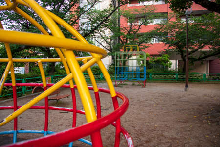 Playground equipment in the park / Spherical playground equipment (go around the jungle gym climbing, getting down and playing)の写真素材