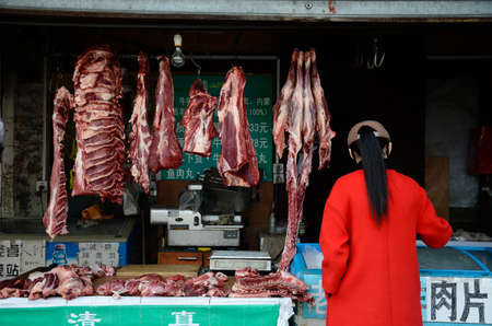 Butcher\'s stall in the marketのeditorial素材