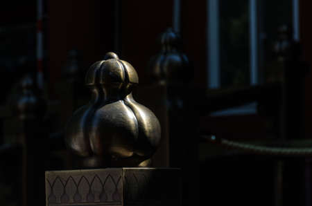 Close up of a decoration on railing postの写真素材