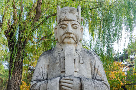 Figurine of old man at parkの写真素材