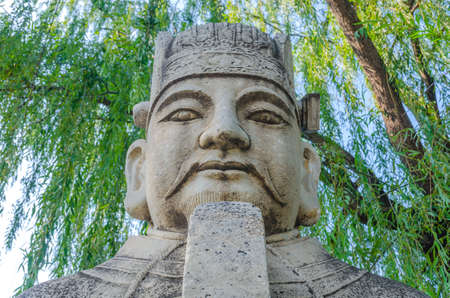 Figurine of old man in the parkの写真素材