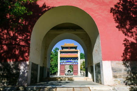 View of the gate of Changling through a corridor at Ming tombsのeditorial素材