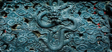 Stone carving with dragonの写真素材