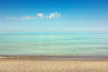 Quiet clean sea in a sunny dayの写真素材
