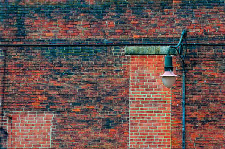 Old brick building and lamp postの写真素材