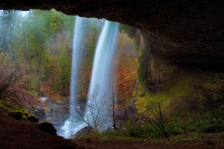 Behind North Falls at Silver Falls State Park near Silverton, Oregon with autumn colorsの写真素材