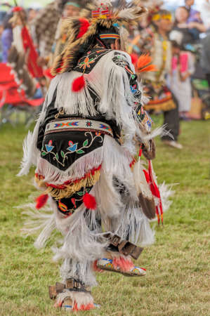 Portland, Oregon USA - June 14, 2014: A Native American Indian in full regalia dances at the annual Delta Park Pow Wow in Portland, Oregonのeditorial素材