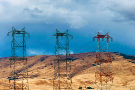 Power Towers fill the landscape of rolling hills in the Columbia River Gorgeの写真素材