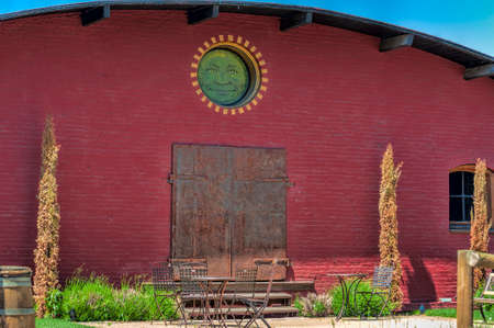 The Dalles, Oregon USA - May 11, 2014: Part of an Old Grainery site, is now owned by Sunshine Mill Winery and their outdoor seating in The Dalles, Oregonのeditorial素材
