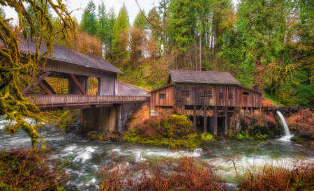 Listed on the national Register of Historic Places, Cedar Creek Grist Mill is a water-powered mill.  It was built in 1876 and has been structurally restored to its current condition. A historical covered bridge crosses the creek of the same name.の写真素材