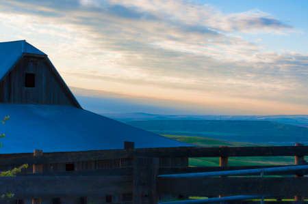 Blue Hour view of out buildings and vast landscape of The Dallas Mountain Ranch, a popular hiking and picture taking place that is part of the Columbia Hills Natural Preserve and State park in the state of Washington in the Columbia River Gorge.の写真素材