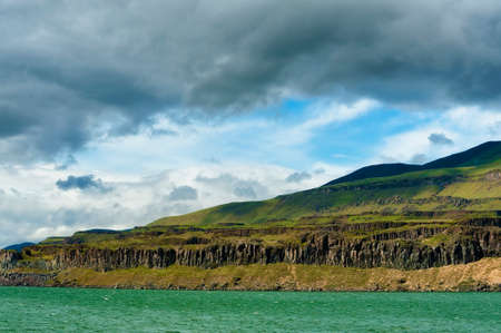 View of the Washington side of the Columbia River taken from car on Interstate 84 on the Oregon side of the Columbia River Gorgeの写真素材