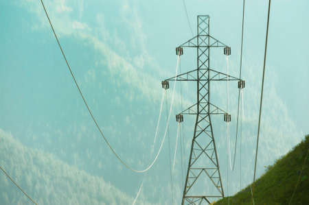 Abstract of Powerlines against a background of Alpine forest.の写真素材